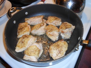 Chicken is turned skin side up, to brown the bottom of the thigh! 